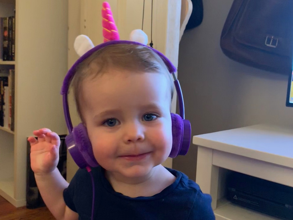 Emma wearing the iFrogz Little Rockers headphones