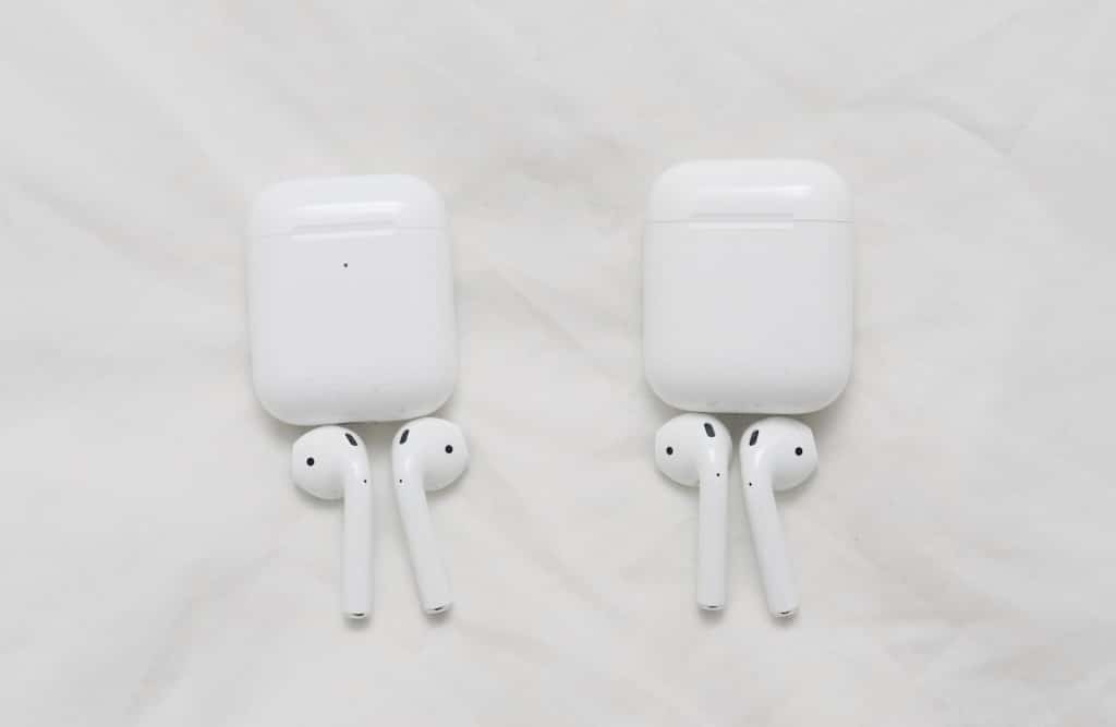 Apple AirPods (2019) on the left with AirPods (2017) on the right