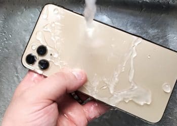 Washing an iPhone 11 Pro Max under a tap