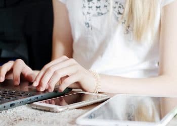Using a few devices to browse online, including a phone, a computer, and a tablet.