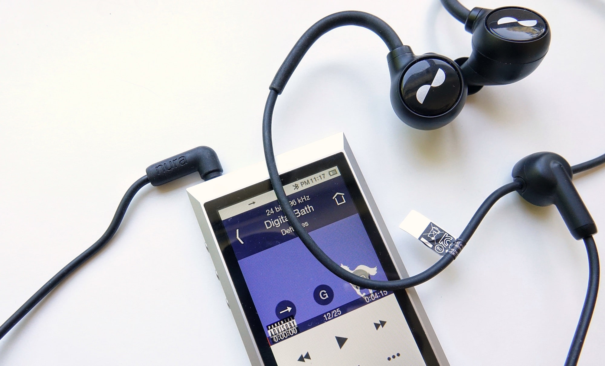 Nuraloop plugged into an Astell & Kern media player using the analog cable