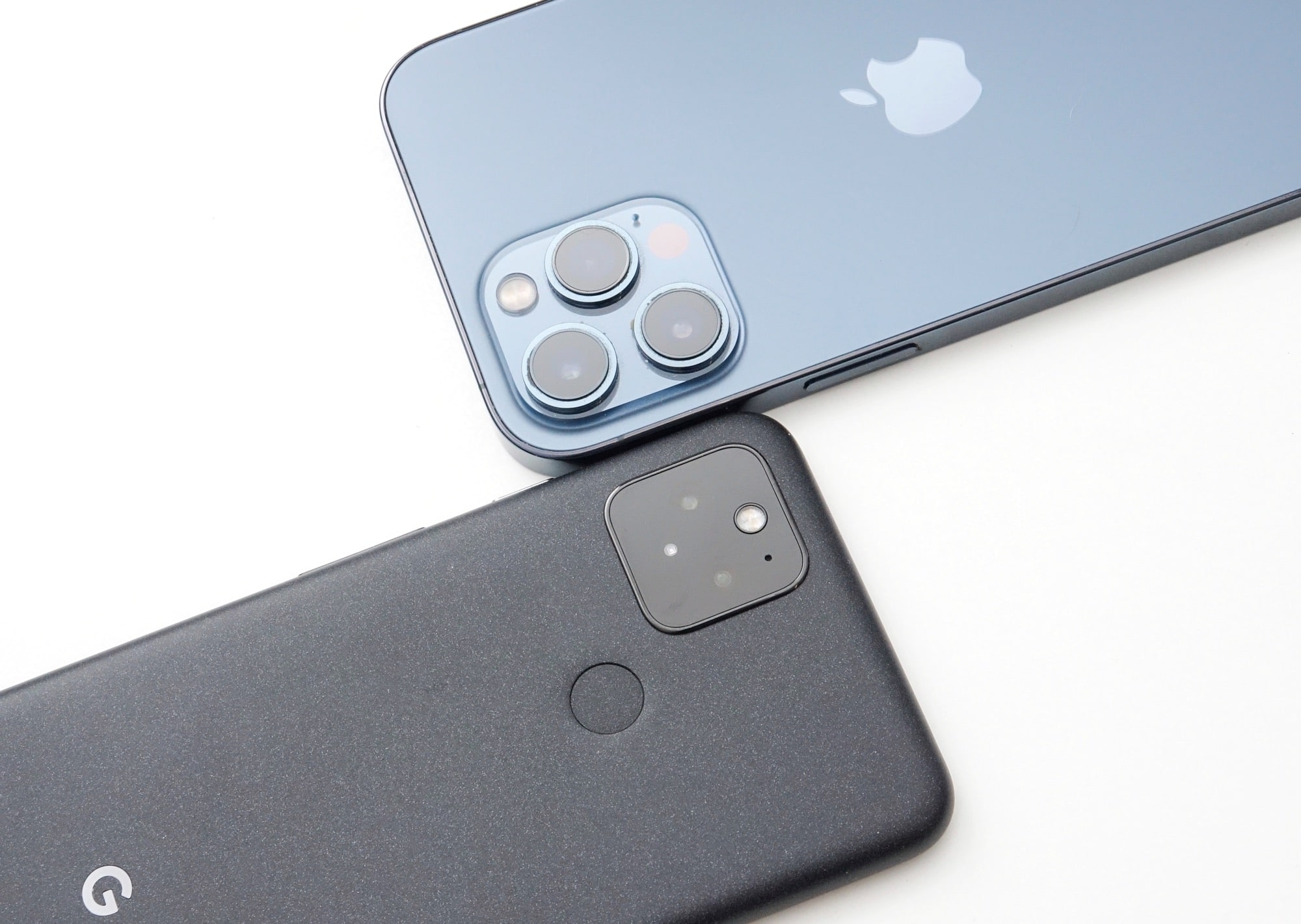 Head to head: the Google Pixel 5 (left) vs the Apple iPhone 12 Pro Max (right)