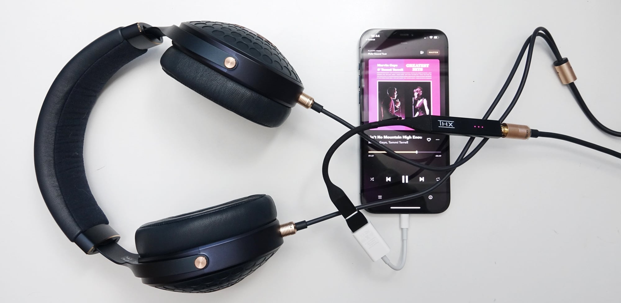 Focal Celestee headphones plugged into the THX Onyx USB DAC and into an iPhone 12 Pro Max