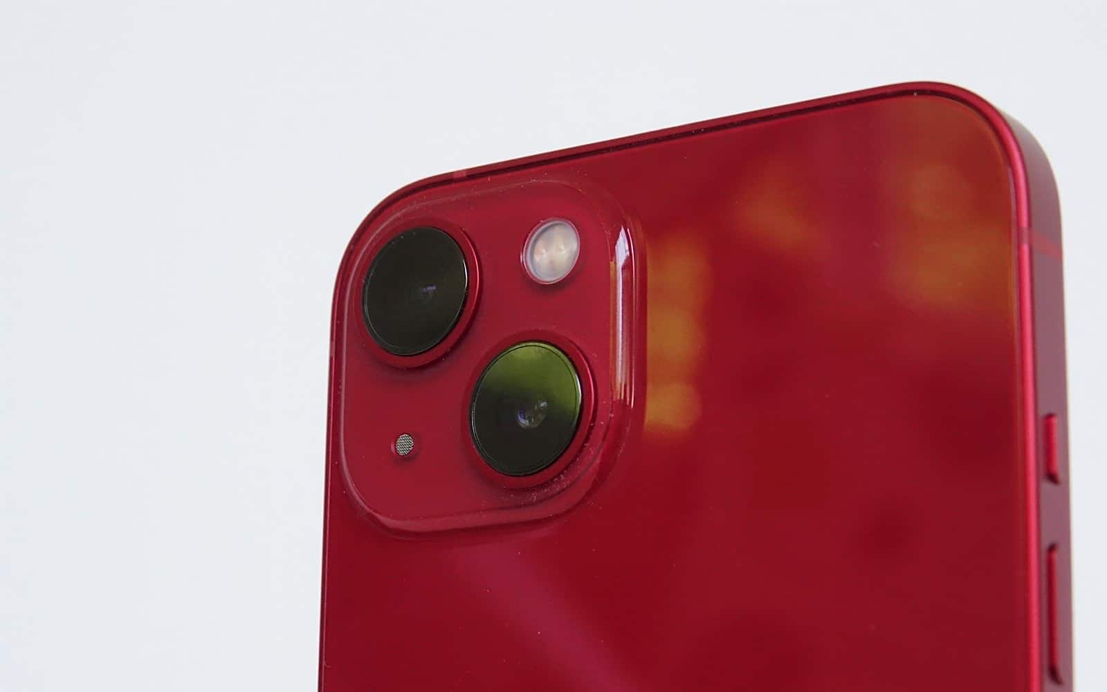 The dual cameras on the back of the iPhone 13