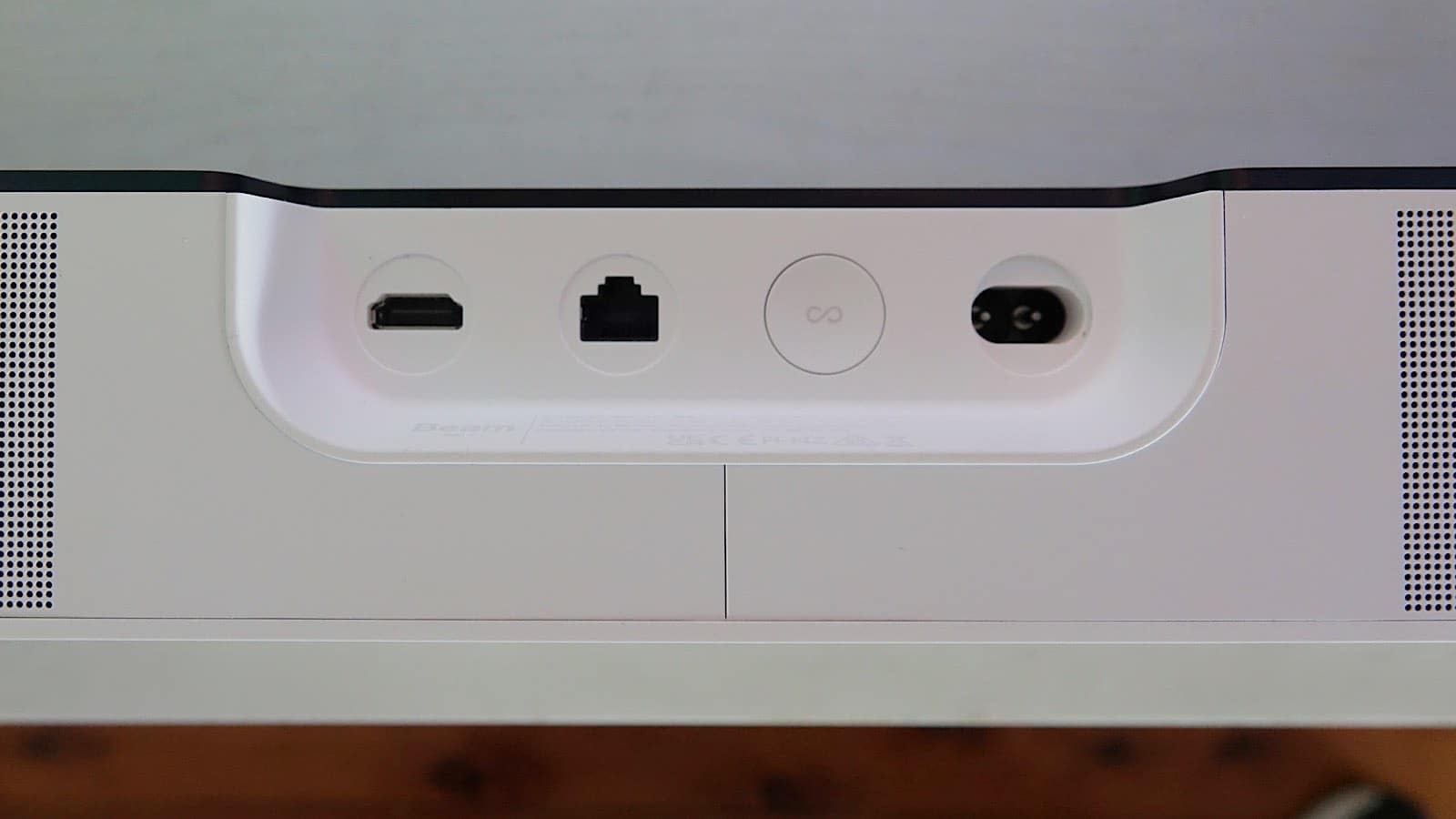 The rear ports on the Sonos Beam Gen 2 include HDMI, Ethernet, and a figure-eight power connector, plus a sync button.