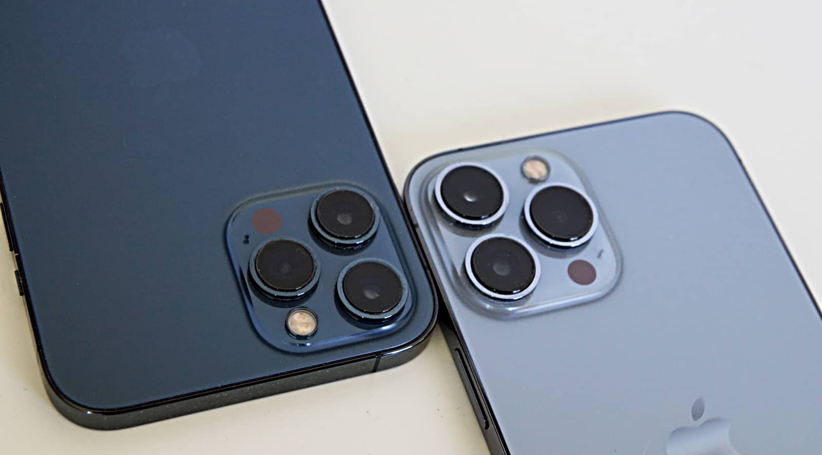 The cameras of the Apple iPhone 12 Pro Max (left) versus the iPhone 13 Pro Max (right).