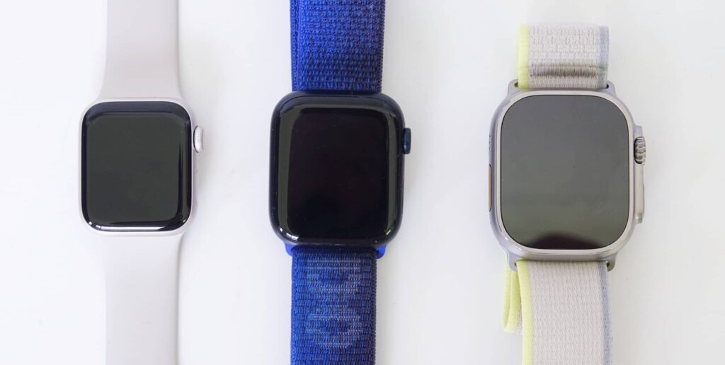 From left to right: the 2022 Apple Watch SE, the Apple Watch Series 8, and the Apple Watch Ultra.