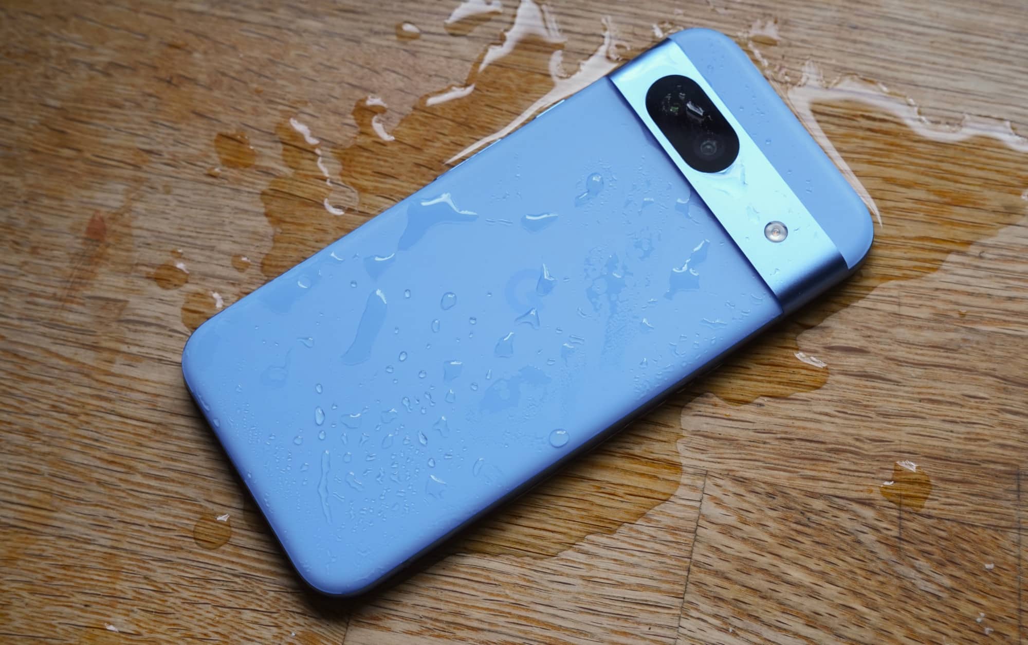 The Pixel 8a is IP67 water resistant. Seen here after having water poured on it for this photo.  
