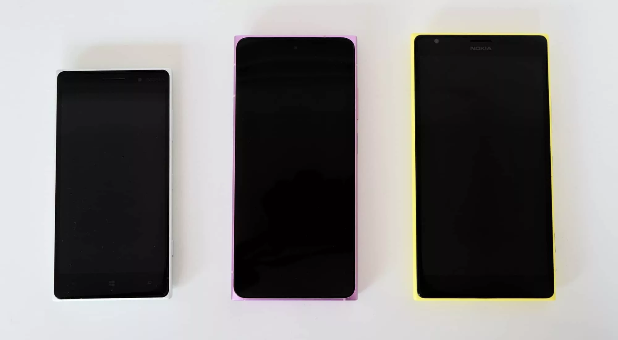 The HMD Skyline (middle) flanked on each side by old Nokia Lumia models, the 735 on the left and the 1520 on the right. 