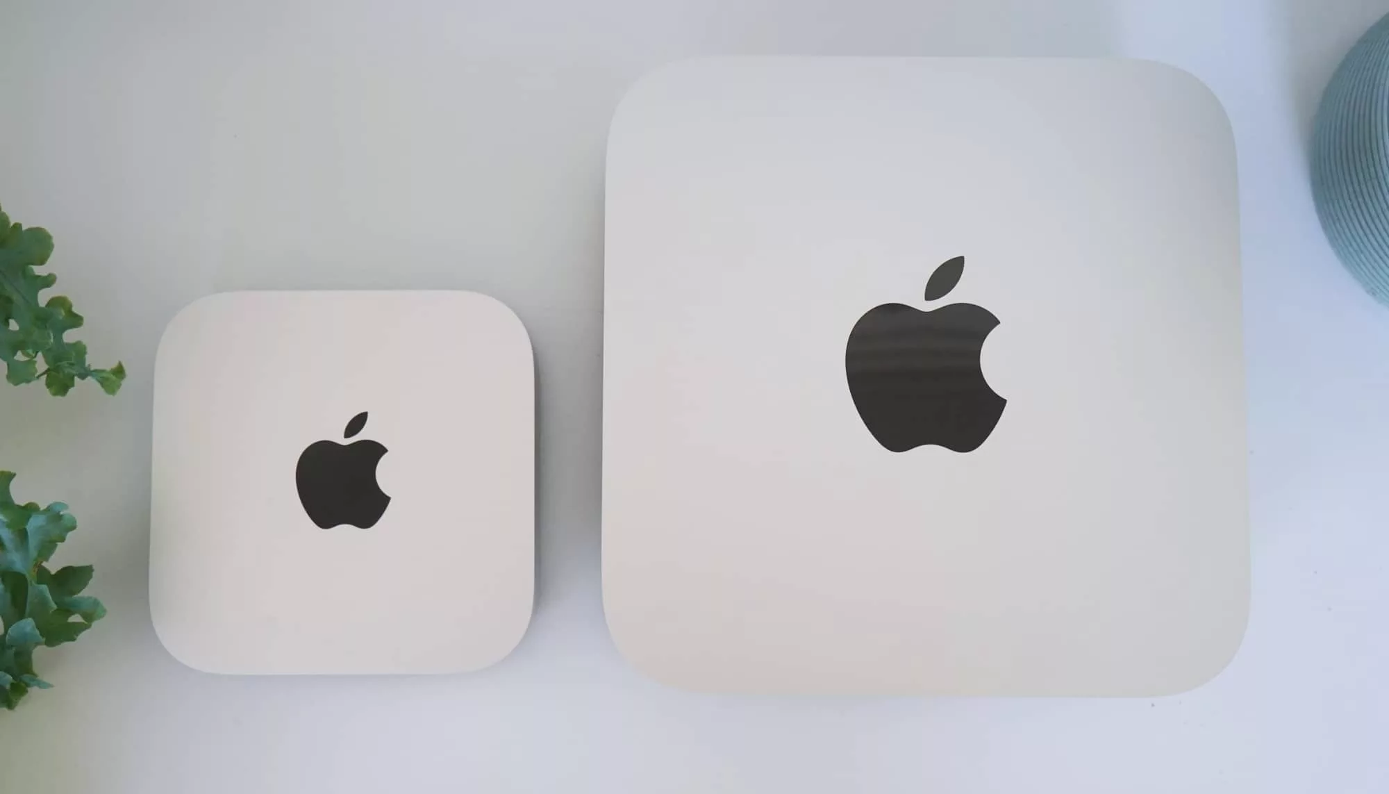 The size difference between the compact square of the Mac Mini (left) and the larger square of the Mac Studio (right).