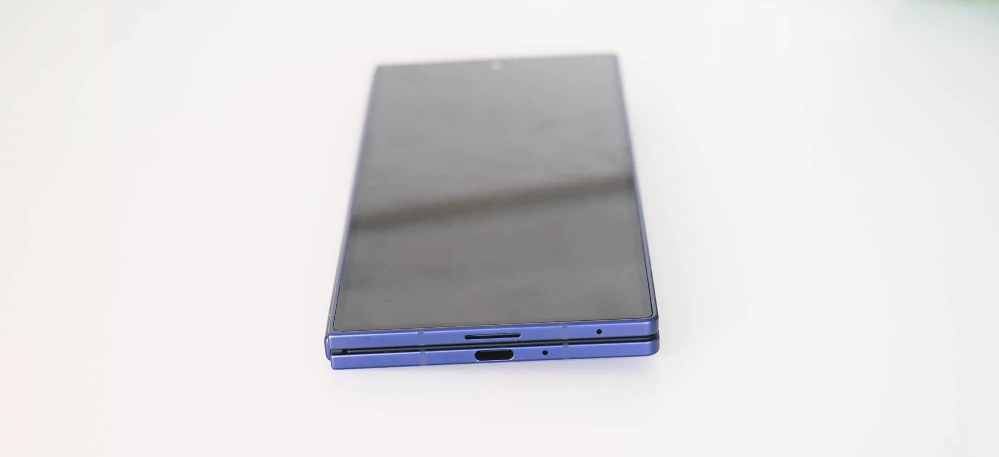 The phone kind of tilts to the left when closed on a surface. 